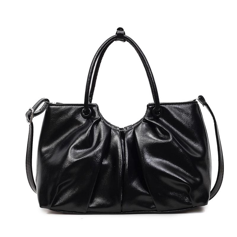 High-end niche bag women's autumn and winter 2025 new retro soft leather messenger bag women's hand-held pleated bucket bag