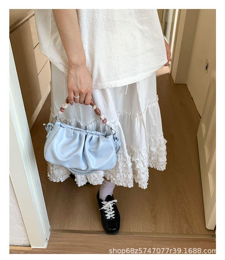 

Summer 2025 new pleated pearl chain bag bag women s fashion one shoulder underarm bag casual women s bag cloud bag синий