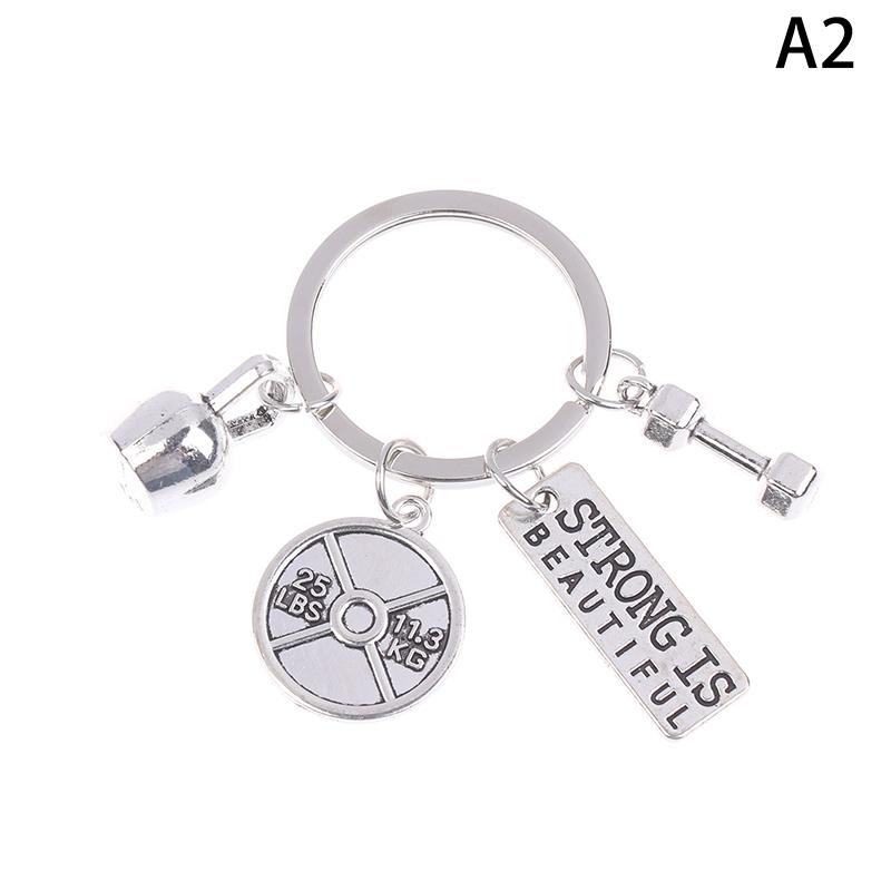 

Strength Sports Barbell Dumbbell Pendant Weight Fitness With Words Gym Crossfit Keyring Keychain For Men Gift Coach Souvenir