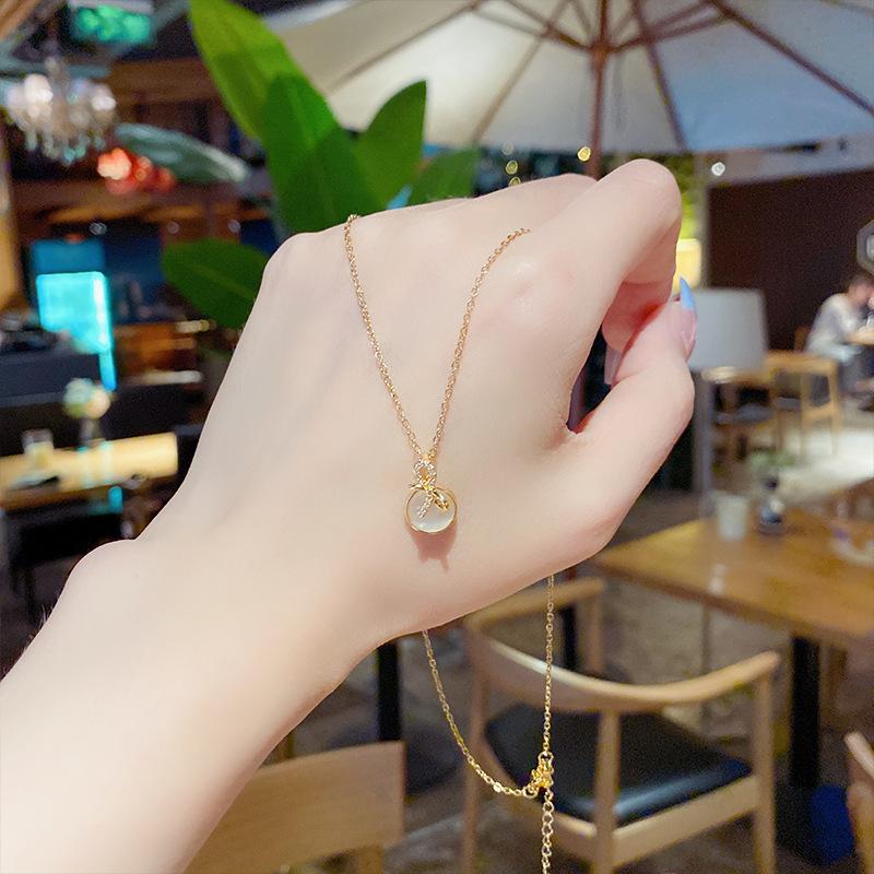 Online celebrity bow necklace titanium steel simple personality design sense Opal clavicle chain hot accessories.