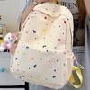 Schoolbag wholesale summer new junior high school girl heart floral shoulder large capacity simple new versatile travel backpack