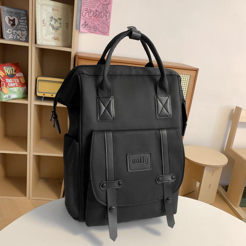 Stylish Mommy Bag: Hand-held Baby & Mother Backpack for Light Travel