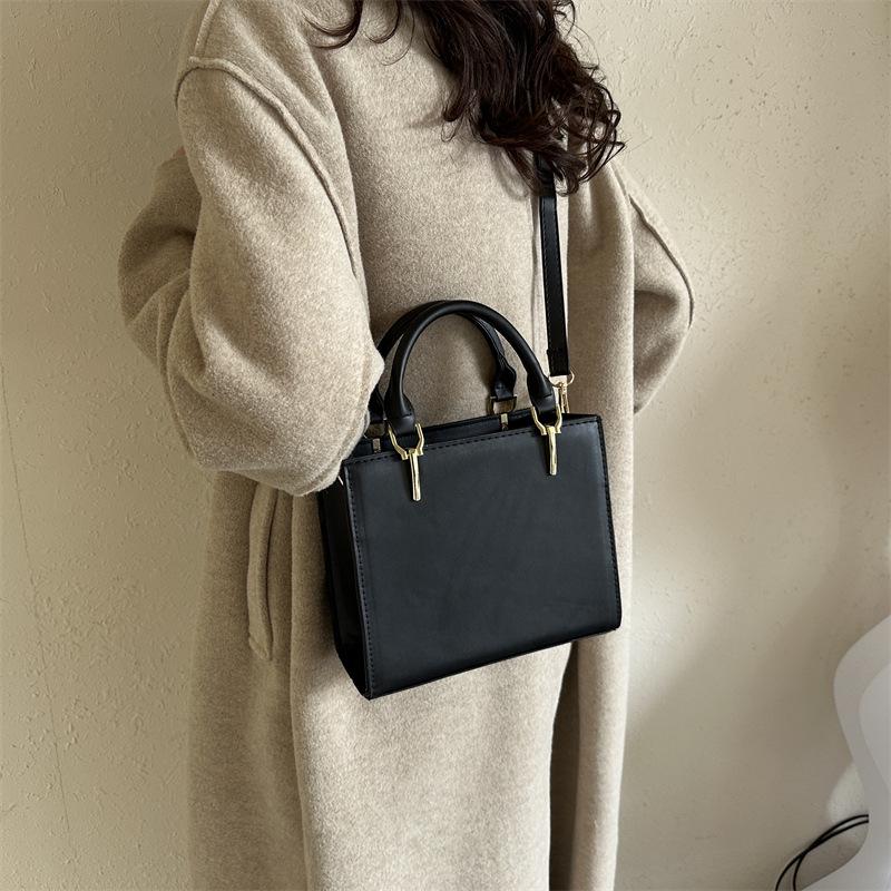 2024 Spring Women's Minimalist Crossbody Shoulder Bag - High-Quality, Fashionable, Versatile Handbag with Unique Stitching.