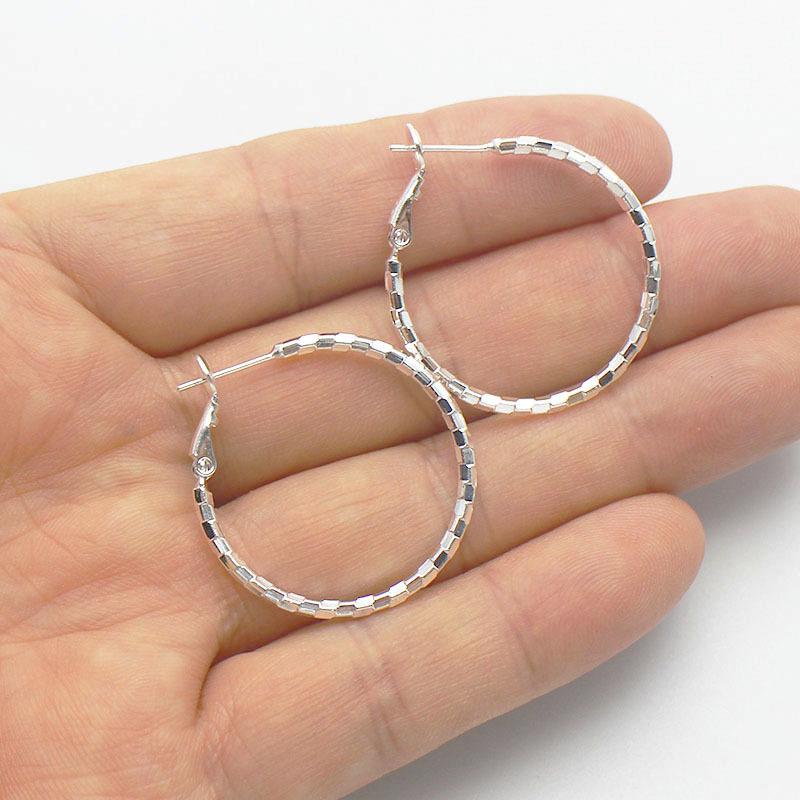 Silver-Plated Copper Bamboo Joint Large Round Hoop Earrings with Classic Face-Shaping Design and Plain Earring Backs.