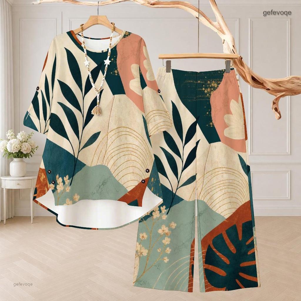 Women Plus Size White Printed Two Piece Set Round Neck Half Sleeve High Low Top Wide Leg Pants