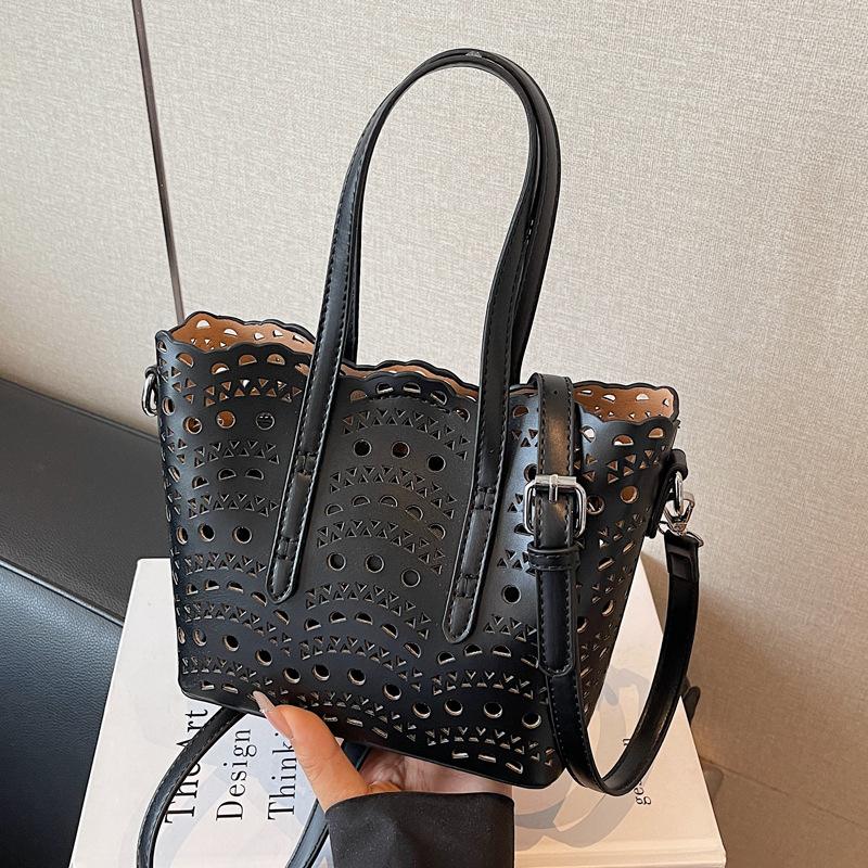 High-end carved hollow portable small bag women's 2025 new fashion texture bucket bag single shoulder messenger bag tide