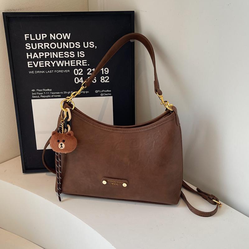 

Niche crossbody armpit bag women s bag new temperament simple fashion fashion one-shoulder commuter bag Without pendant коричневый