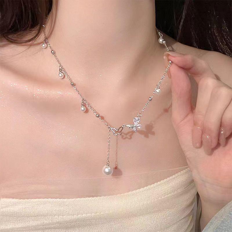 Korean Pearl Necklace: High-End Silver Clavicle Chain with Niche Design, Perfect for Light Luxury and Sweater Pendants.