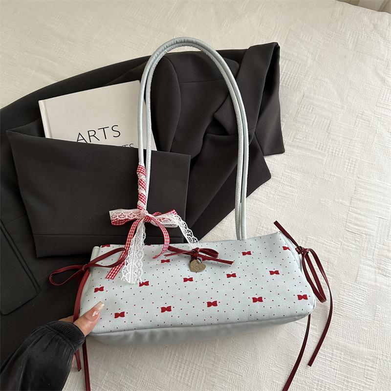 

Новая милая сумка-багет с бантом под мышкой для женщин 2025 новый зарубежный стиль в горошек сумка-багет на плечо синий