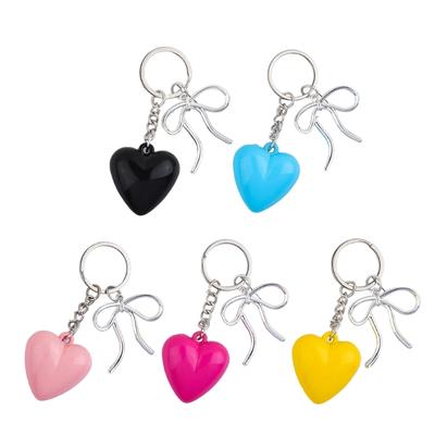 Porte-clés élégant en forme de cœur et nœud papillon en résine pour femme, porte-clés tendance pour sac à dos, sac à main, sac à main