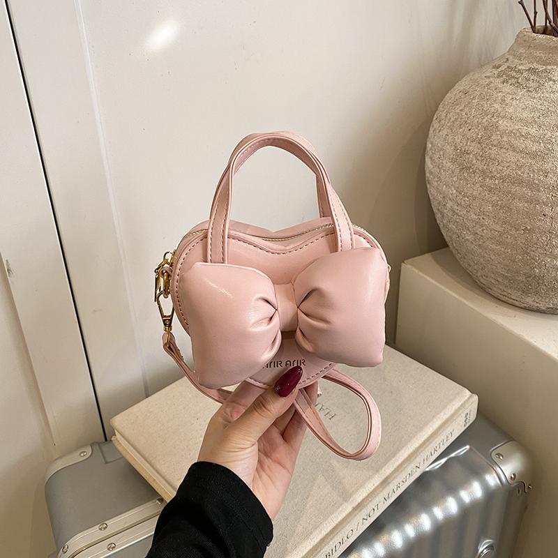 Fashion Solid PU Sweet Bowknot Handbag Cute Heart Shape Bow Mini Crossbody Bag Hot Sale Personality Shoulder Bag for Women Girls