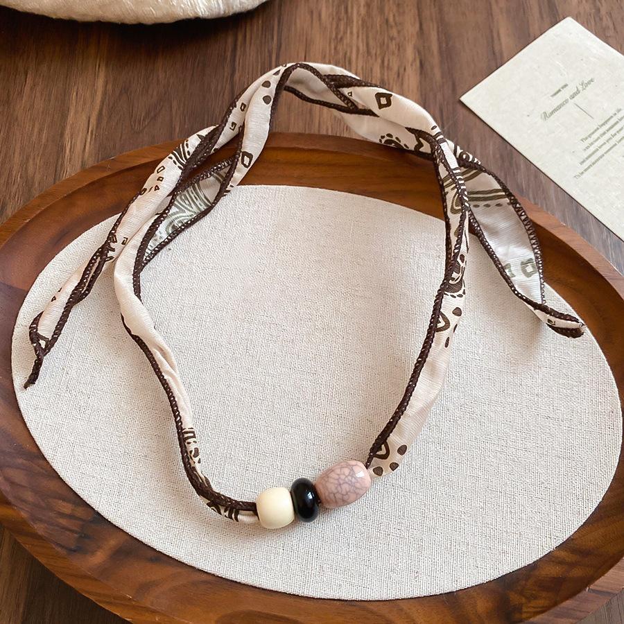 Retro style coffee fabric acrylic love necklace light luxury sweater chain versatile necklace women