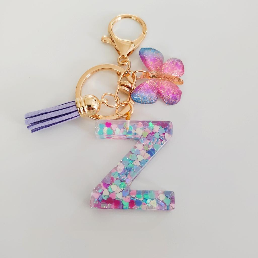 Fashion butterfly fringe initial keychain Drop glue Blend sequin A-Z26 letter keychain Cute Ladies Student Bag Accessory Gift