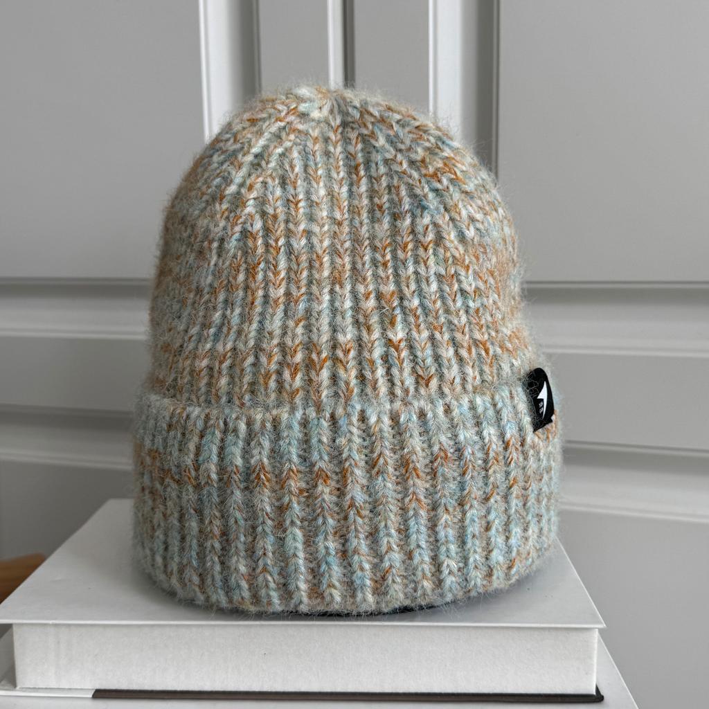 Autumn and Winter Advanced Sense Mixed Color Knitted Wool Headgear Women's Autumn and Winter Warm Versatile Cold Hat Shows Small Face