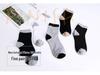 Men's Mid-Calf Jacquard Solid Color Socks - Five Pairs, Breathable & Casual for All Seasons