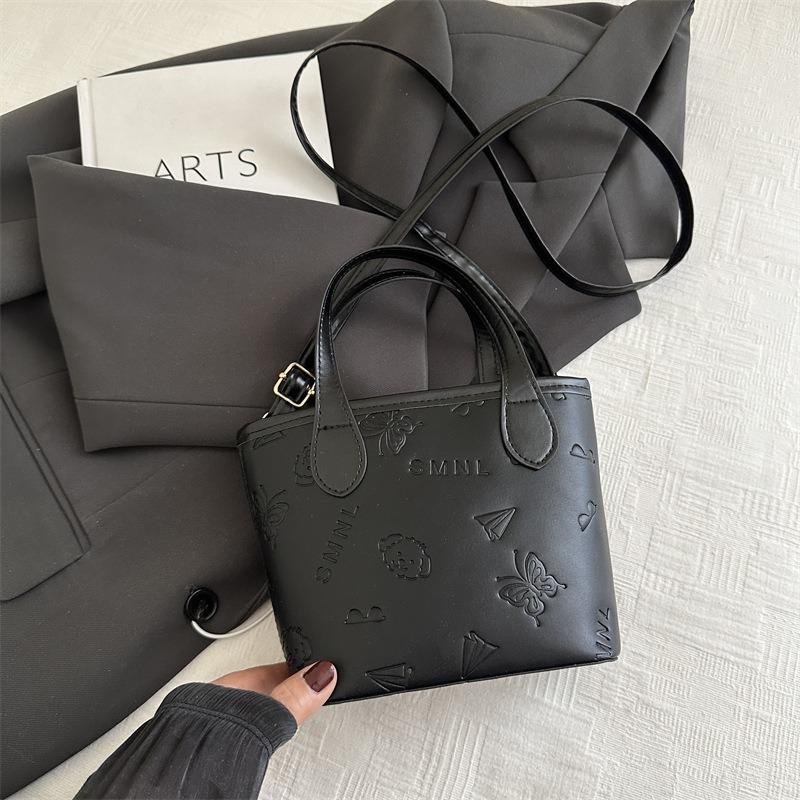 

Today s popular textured small bags, spring and summer new versatile messenger bags, portable mini bucket bags