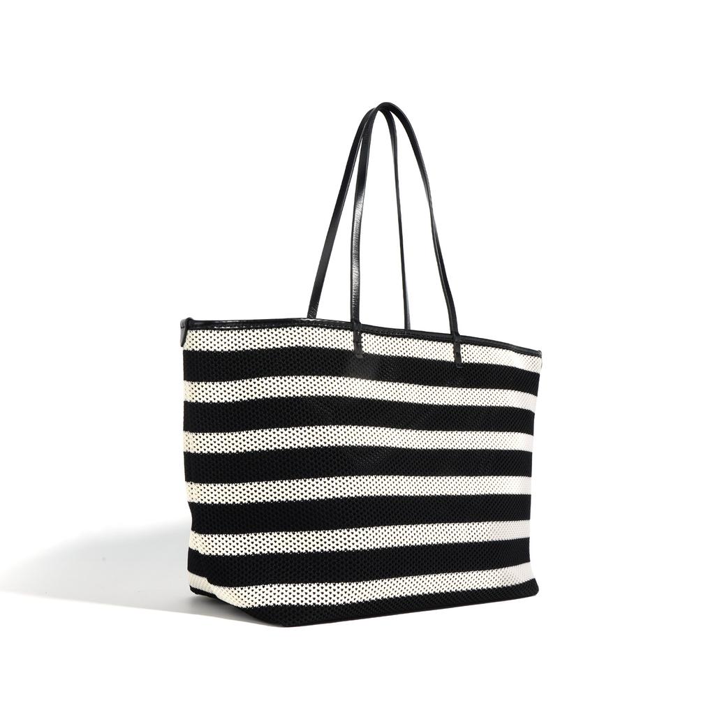 2025 erste Schicht Rindsleder gewebte Tragetasche großes Fassungsvermögen hohler Gemüsekorb Eimertasche lässiger Wind leichte Umhängetasche