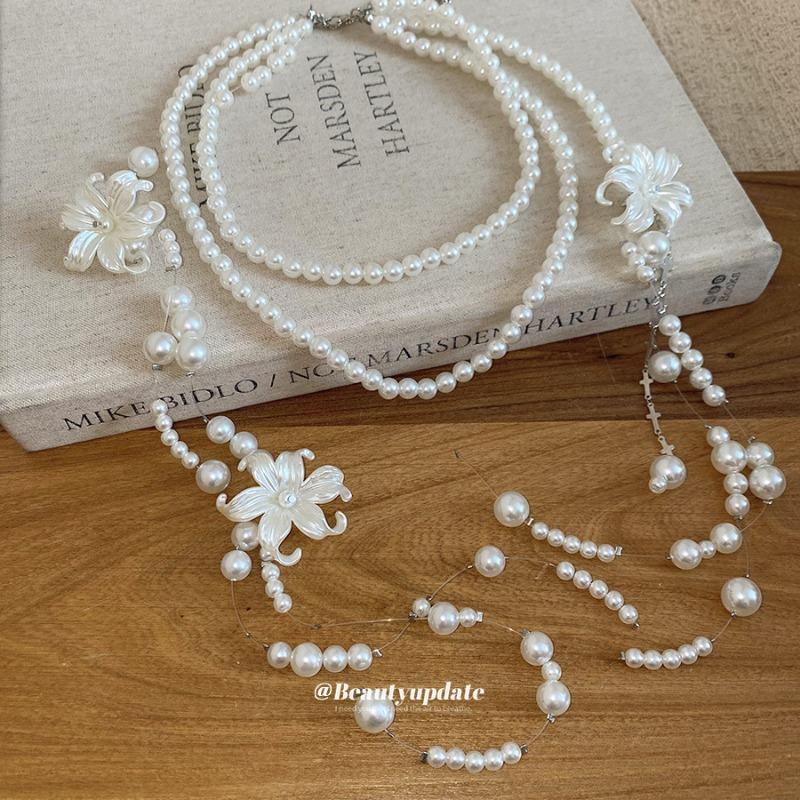 French light luxury flower fringed pearl necklace women's niche design sense long clavicle chain high sense sweater chain women