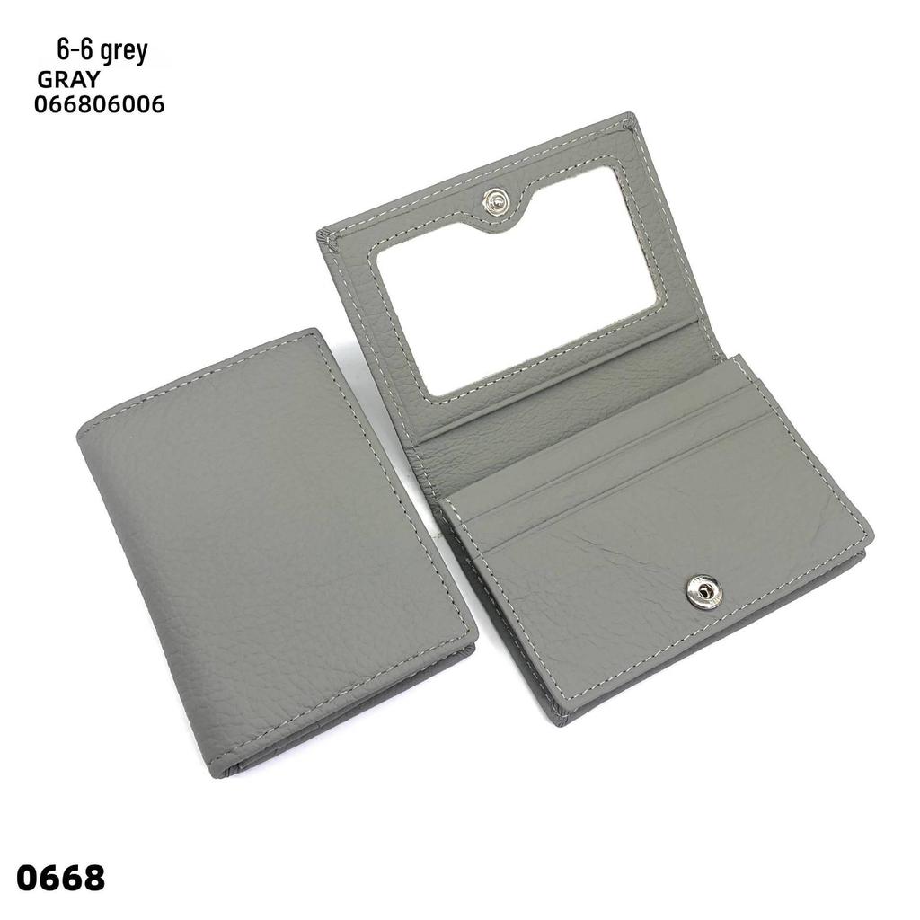 Premium Leather Card Holder: Unisex Cowhide Business Case with Mirror Window, Snap Closure & Coin Purse.