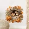 Autumn Squirrel Wall Sticker Featuring Two Squirrels Perched In Tree Holes. Pumpkins and Autumn Leaves Surround Them.