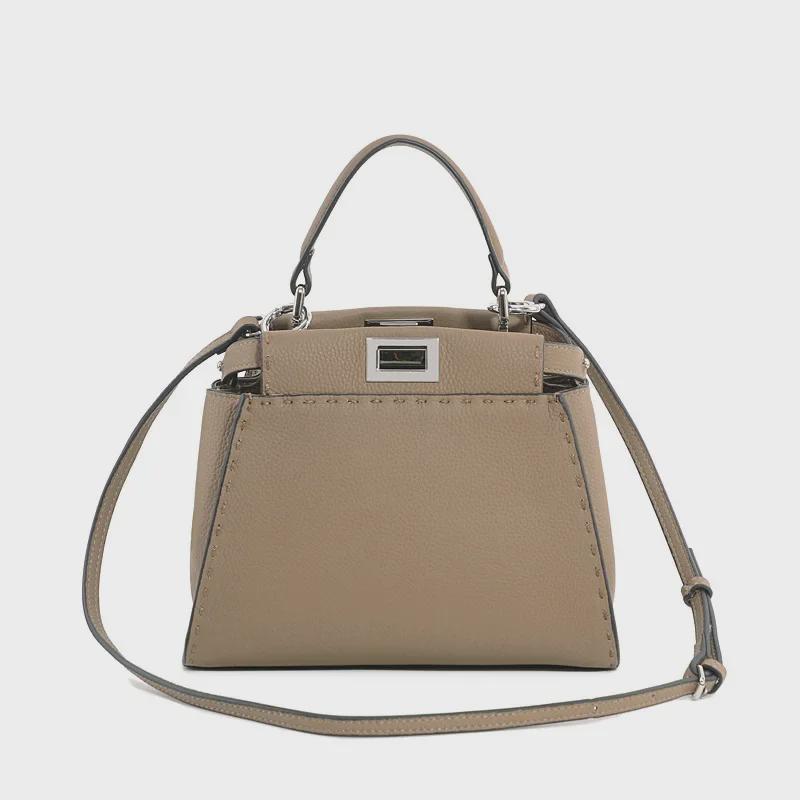 Jaro/léto 2024 Ručně šitá kabelka s motivem koťátka z pravé kůže: Moderní crossbody s liči vzorem