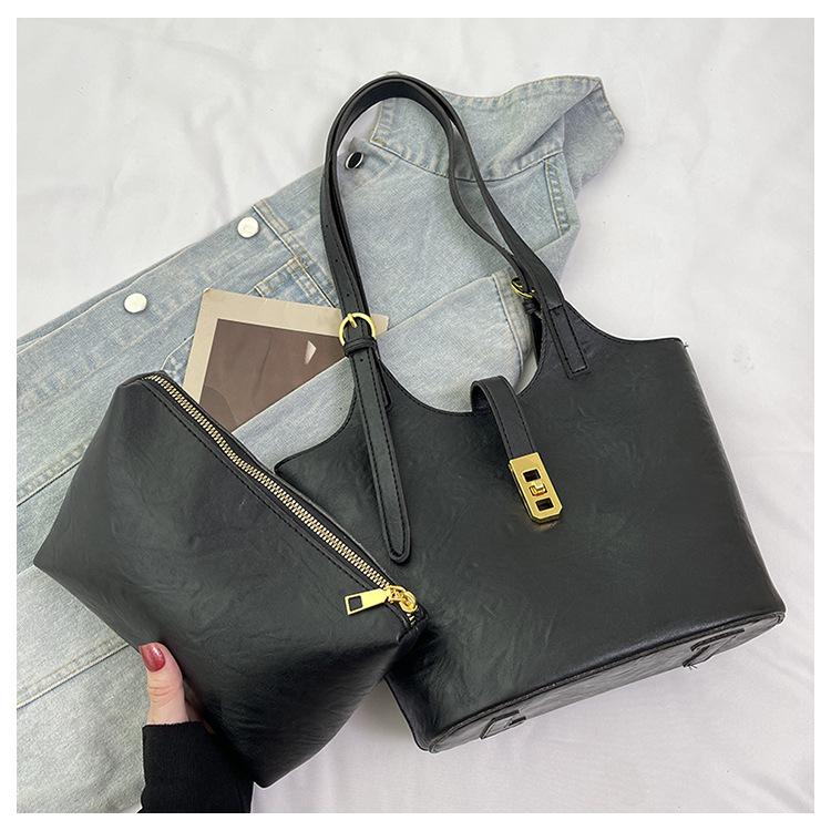 

Korean version handbag women s 2025 new fashion versatile retro bucket bag simple solid color commuter shoulder armpit bag чёрный