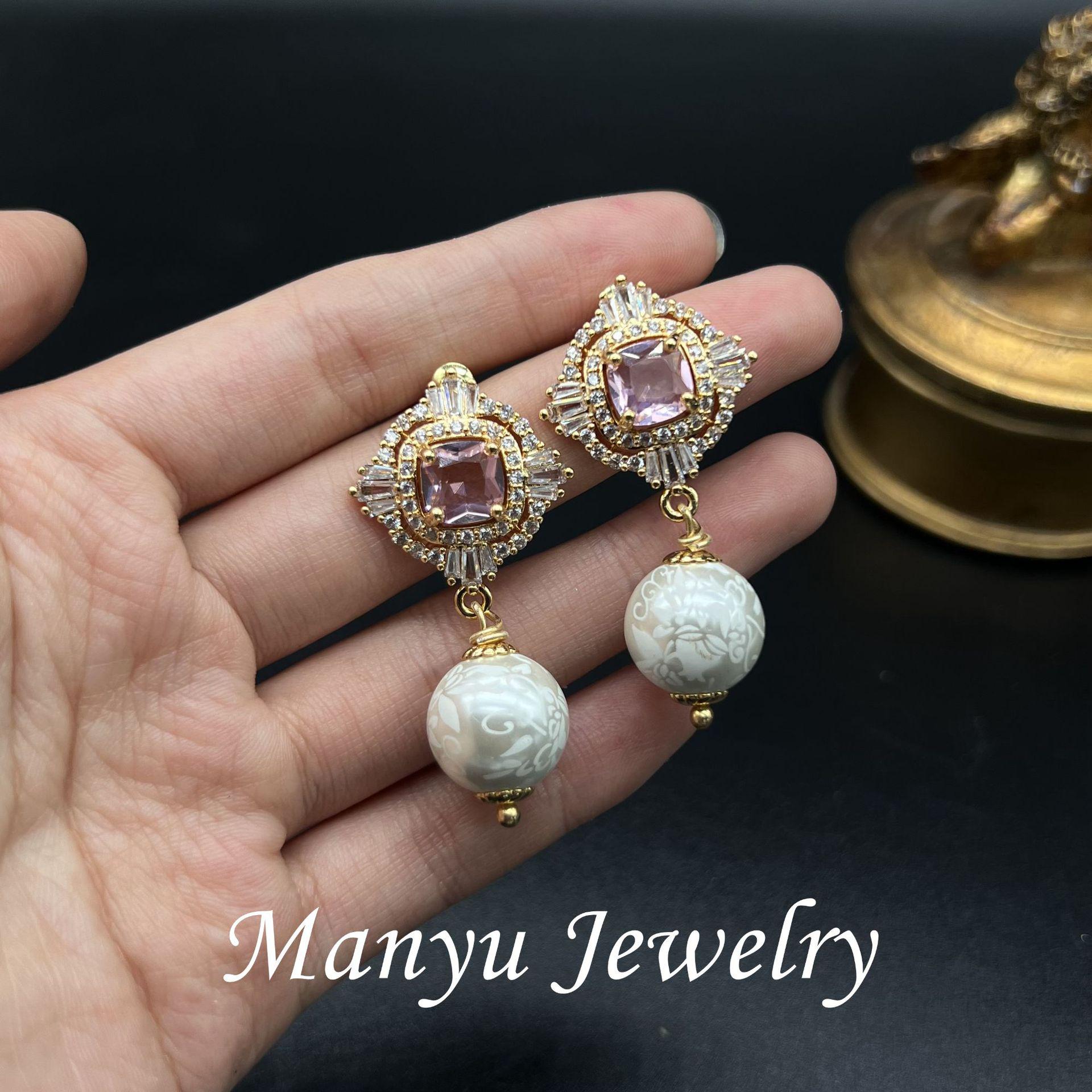 

Ancient Style Retro Carved Alloy Stud Earrings with Diamond Inlaid Pearls