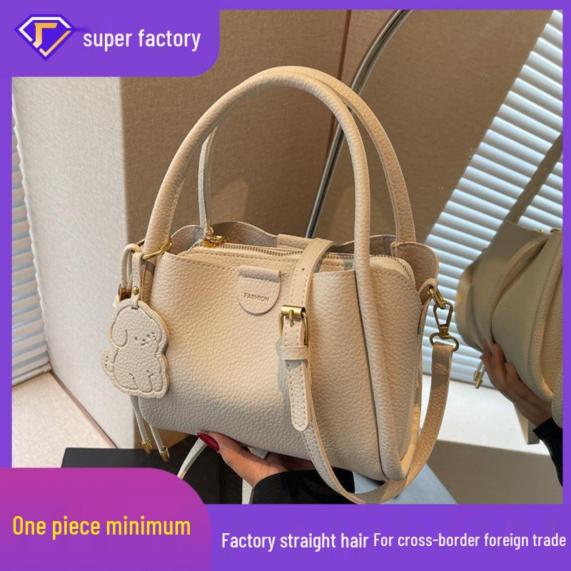 

2025 Spring Women s Handheld Bucket Bag: Chic Commute, Crossbody & Shoulder Style кавовий