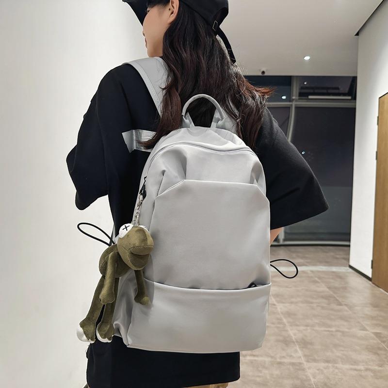 Sac d'école nouveau sac d'école style collège couleur unie grande capacité sac à dos étudiante simple sac à dos femme