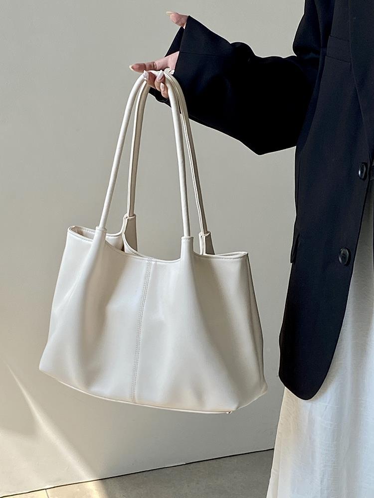 

2024 нишевый дизайн новая женская сумка весна большая вместимость ins ветровая сумка-тоут класс портативная сумка через плечо белый