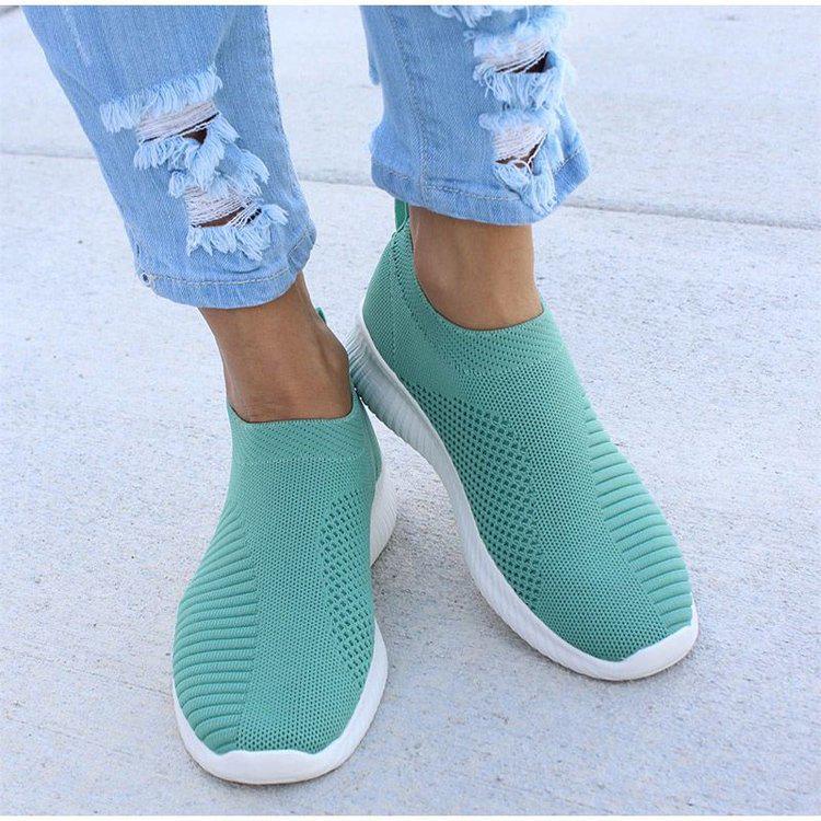New fly-woven light-mouth low-top light and breathable one-pedal round head foreign trade large-size casual flat-soled sports shoes