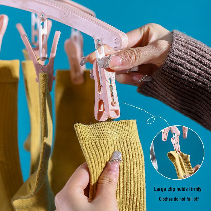 Rotating Multifunctional Clothes Drying Rack with 12 Clips for Socks, Underwear, and Pants