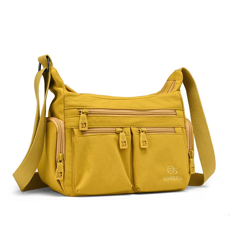 Fashionable Multi Pocket Crossbody Bag with Adjustable Strap and Spacious Design for Daily Use