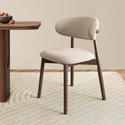 Nordic Modern Minimalist Solid Wood Dining Chair with Soft Pack Backrest - Comfortable Light Luxury Ram's Horn Design for Home, Restaurant, and Hotel.