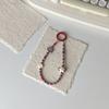 Accesorii pentru telefoane – Curele și brelocuri pentru telefoane