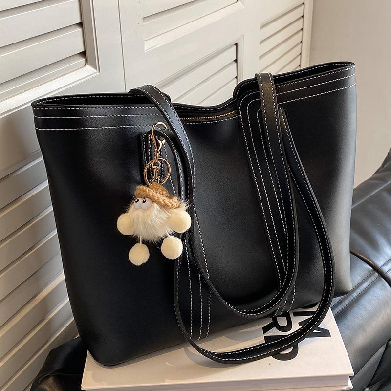 Skulderveske med stor kapasitet og ny stilig tekstur, allsidig pendler-veske for vår og sommer