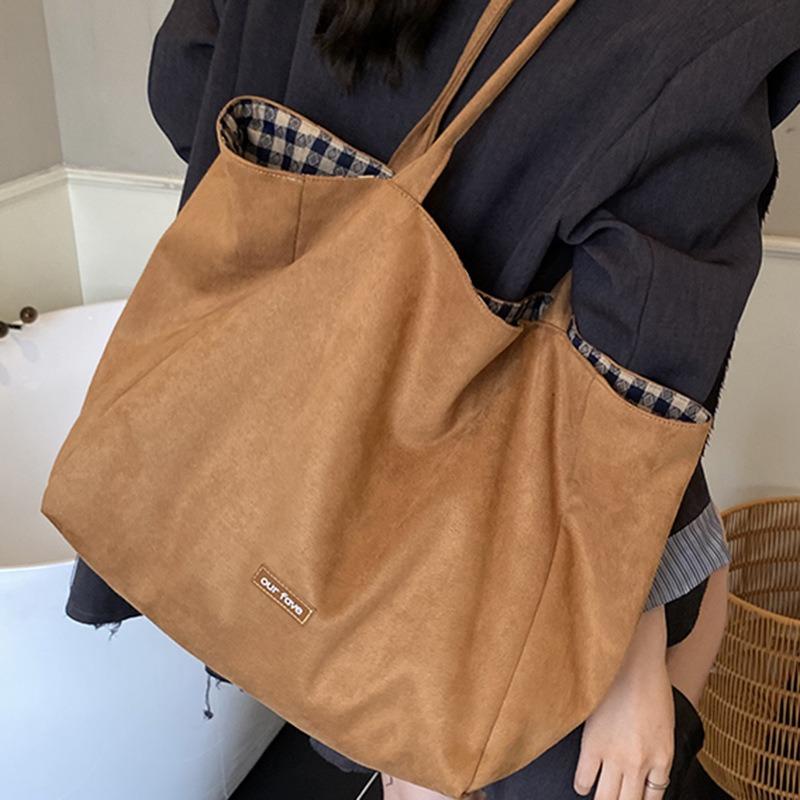 Autumn new niche leopard print canvas bag women's large capacity reversible shoulder bag simple casual commuter bag for work