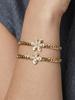 Exquisite 18k Gold-Plated Zircon Flower Jewelry Set: Stackable Stainless Steel Bracelet and Necklace.