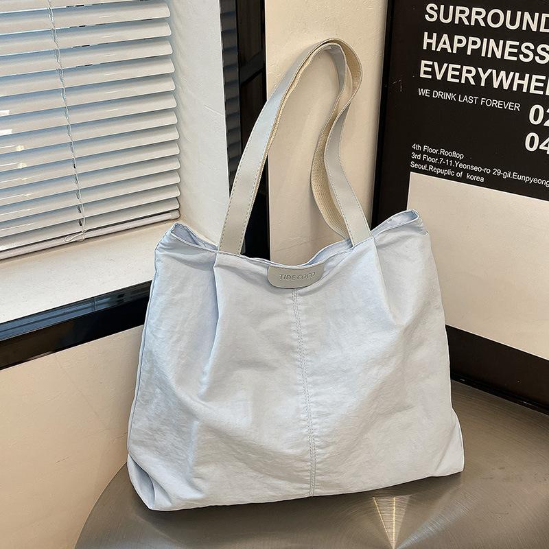 

Shoulder bag New trendy commuter large-capacity nylon tote bag Female college student make-up bag Handbag светло-синий