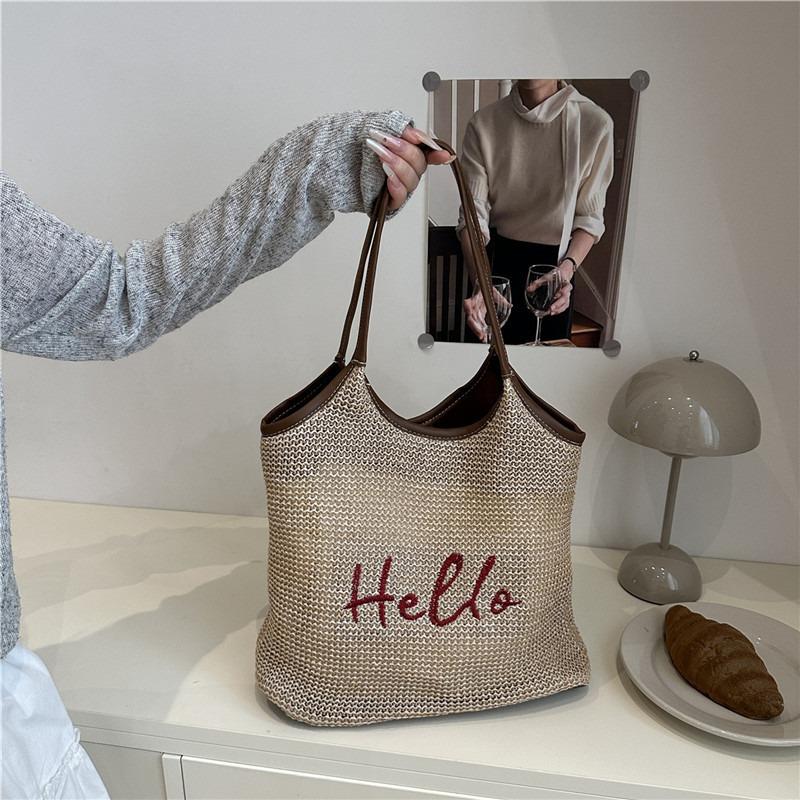 Alphabet woven straw personalized large capacity hollow holiday wind beach shoulder tote bag
