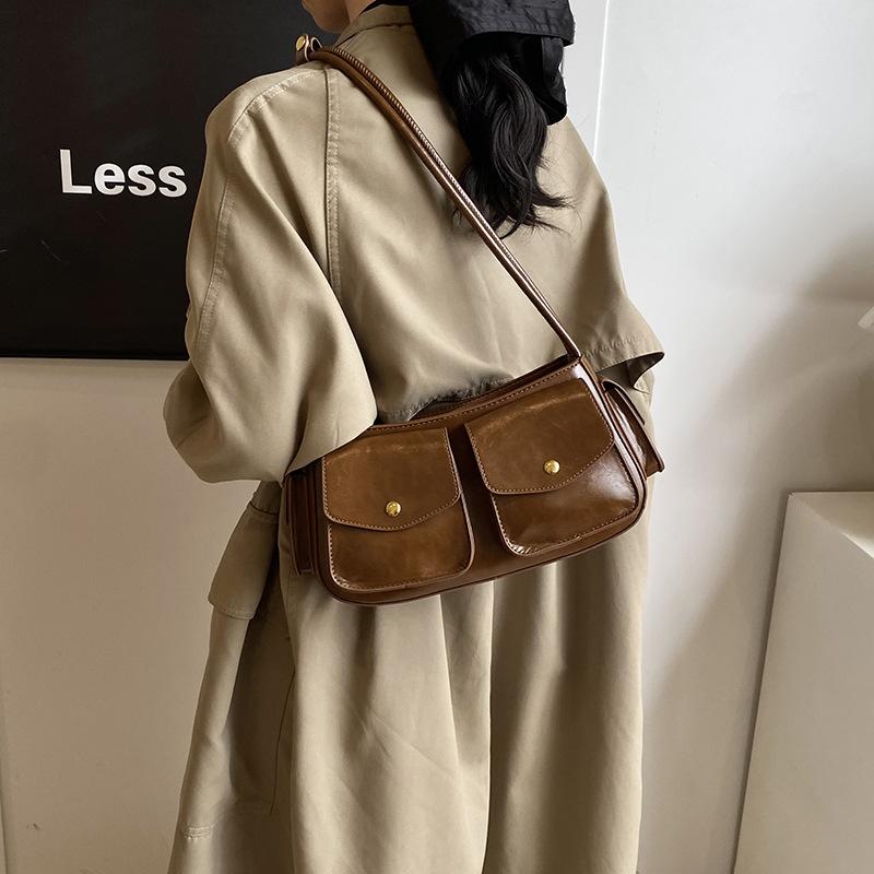 Niche High-end Multi-pocket Locomotive Bag 2025 New Temperament Shoulder Armpit Bag Commuter Messenger Baguette Bag