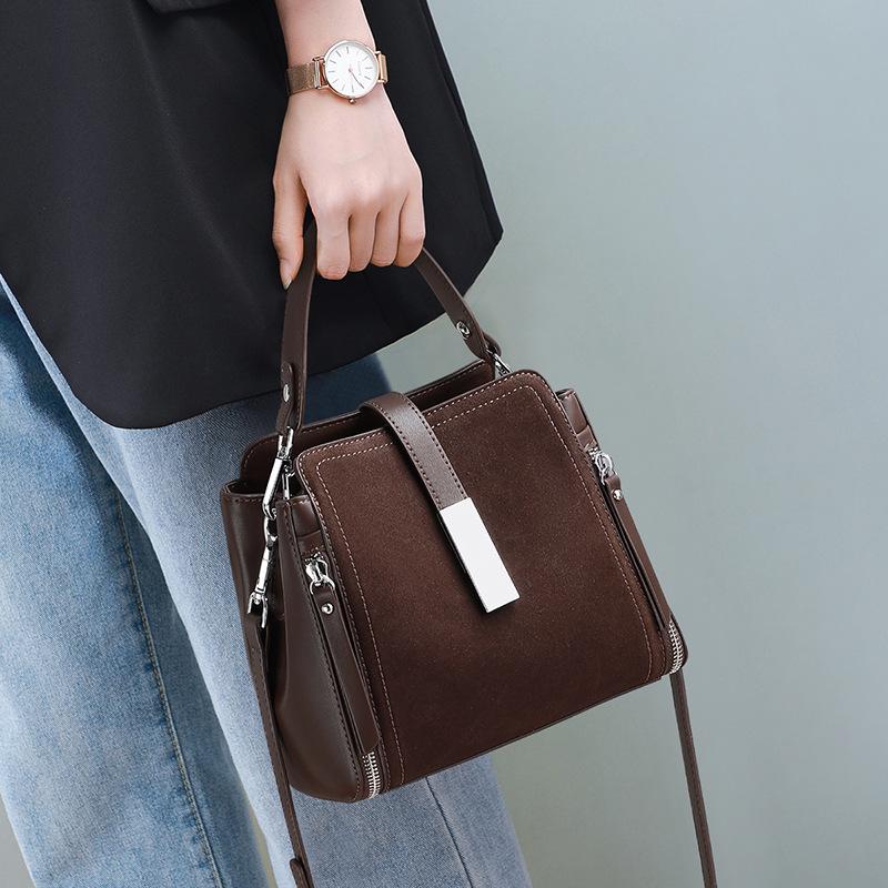 

Retro matte flannel bucket bag women s new explosion high-end sense portable shoulder messenger bag versatile commuter bag