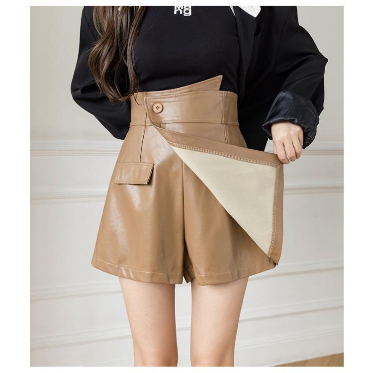 Modischer kurzer Rock aus PU-Leder mit hoher Taille und unregelmäßigem Saum für Damen