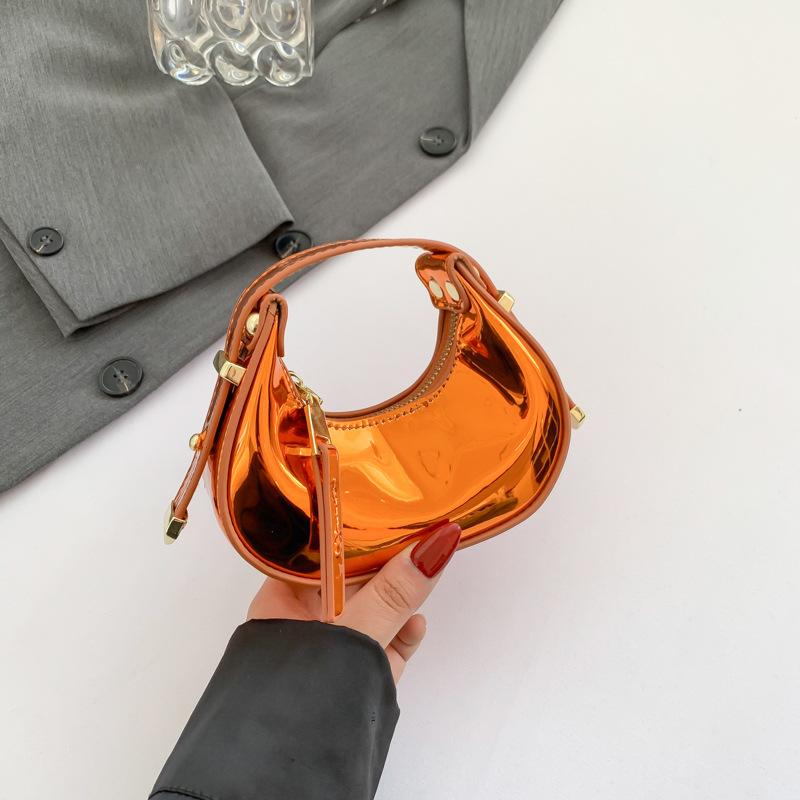 

Women bags women bags 2025 new Mori candy color glossy ins Internet celebrity portable dumpling bag tide помаранчевий