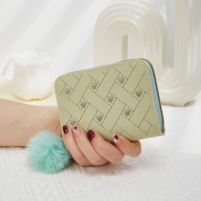 New single zipper multi-functional short women's change bag fashionable and simple hairball decorative wallet
