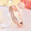 Bague ouverte porte-bonheur pour femme, ornée de micro-diamants pavés torsadés