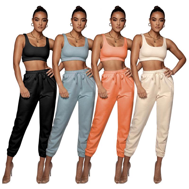 European and American Women's Fashion: Solid Color High-Elastic Shaping Rib-Knit Short-Sleeve Top & Wide-Leg Pants Two-Piece Set.