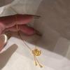 Auspicious Clouds Lock Necklace: Exquisite Gold-Tasseled Clavicle Chain for Women