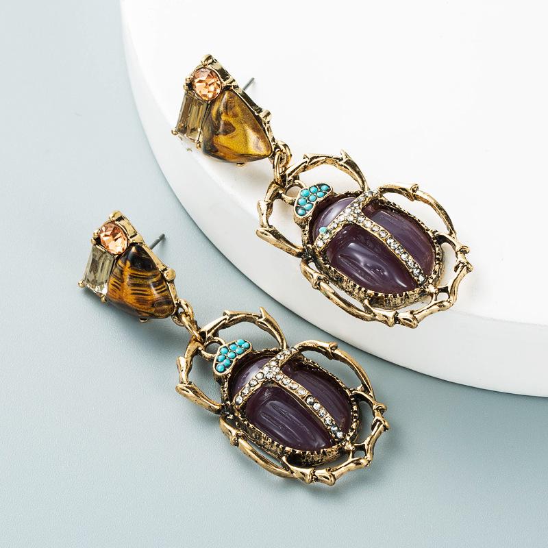 

Женские серьги-капли в стиле ретро, ​​серьги-подвески из титанового стального сплава, акриловые бусины, многослойная статуя головы насекомого, геометрические украшения для ушей OneSize фиолетовый