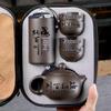 Zisha Travel Tea Set: Portable Xishi Pot with Quick-Brew Cup and Four Cups - Perfect for Outdoor or Home Tea Ceremonies.